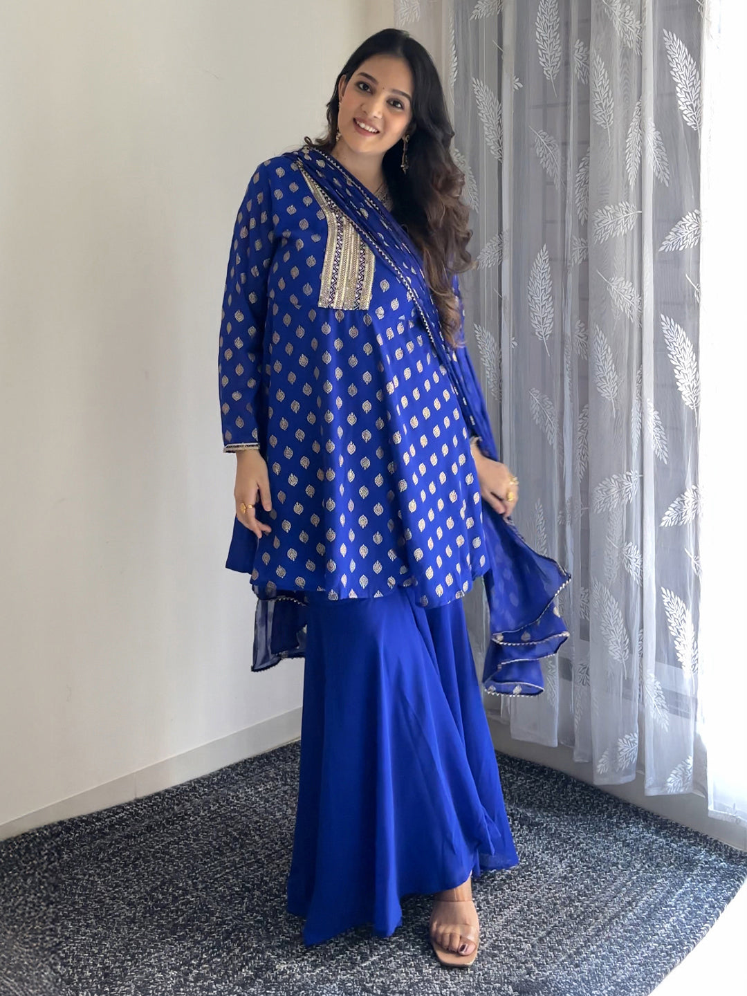 Ninnique Women's Royal Blue Georgette Embellished Gold Printed A-line Kurta With Sharara & Dupatta Set