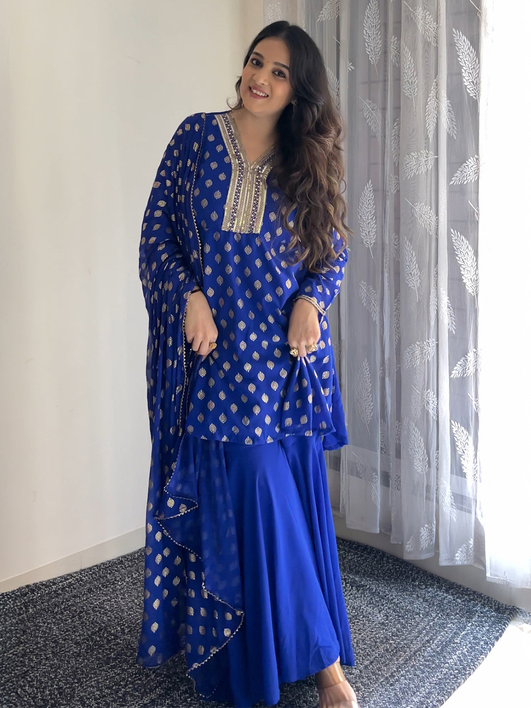 Ninnique Women's Royal Blue Georgette Embellished Gold Printed A-line Kurta With Sharara & Dupatta Set