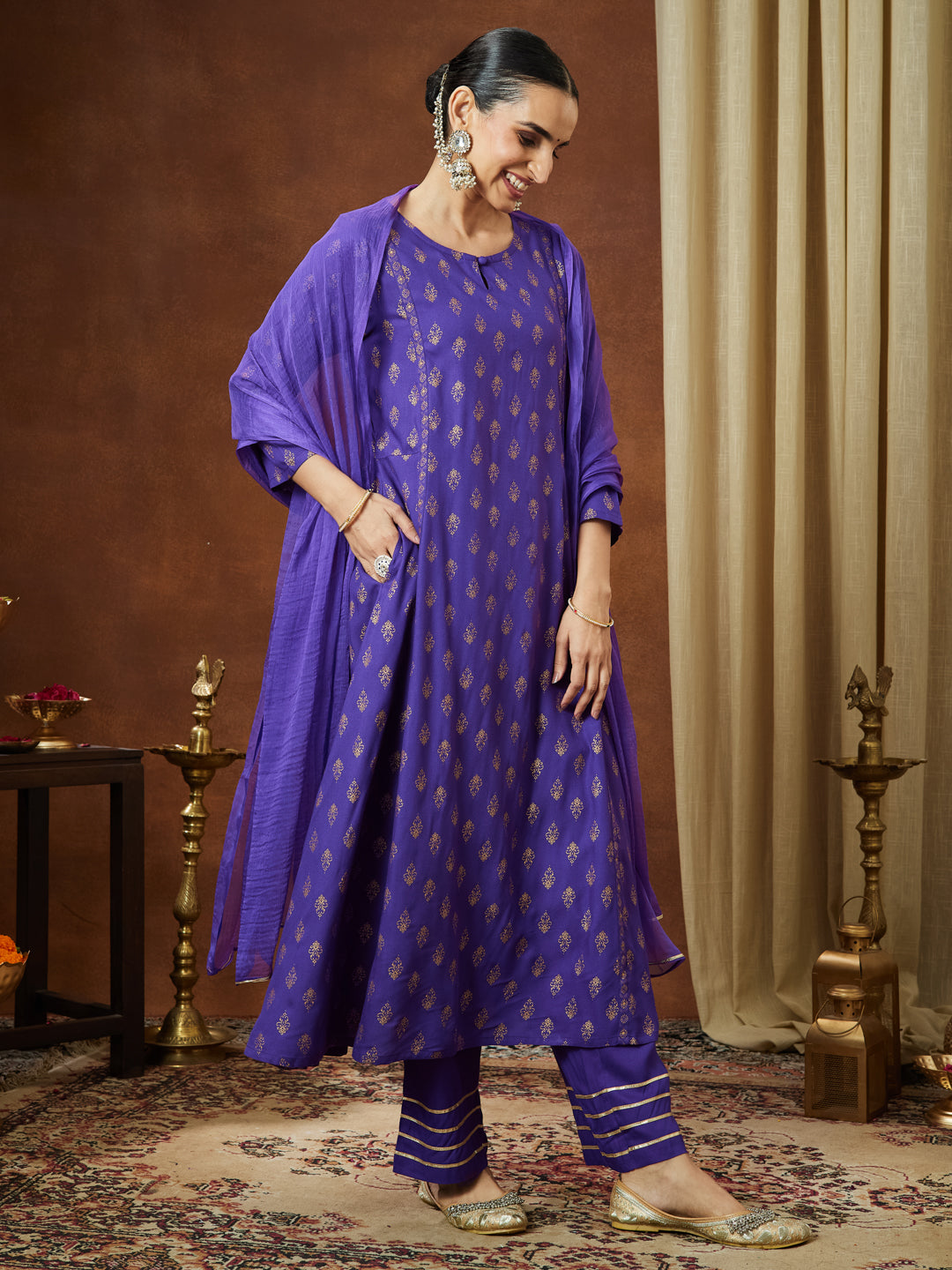 Ninnique Women's Purple Rayon Ethnic Motifs Gold Printed A-line Kurta Set