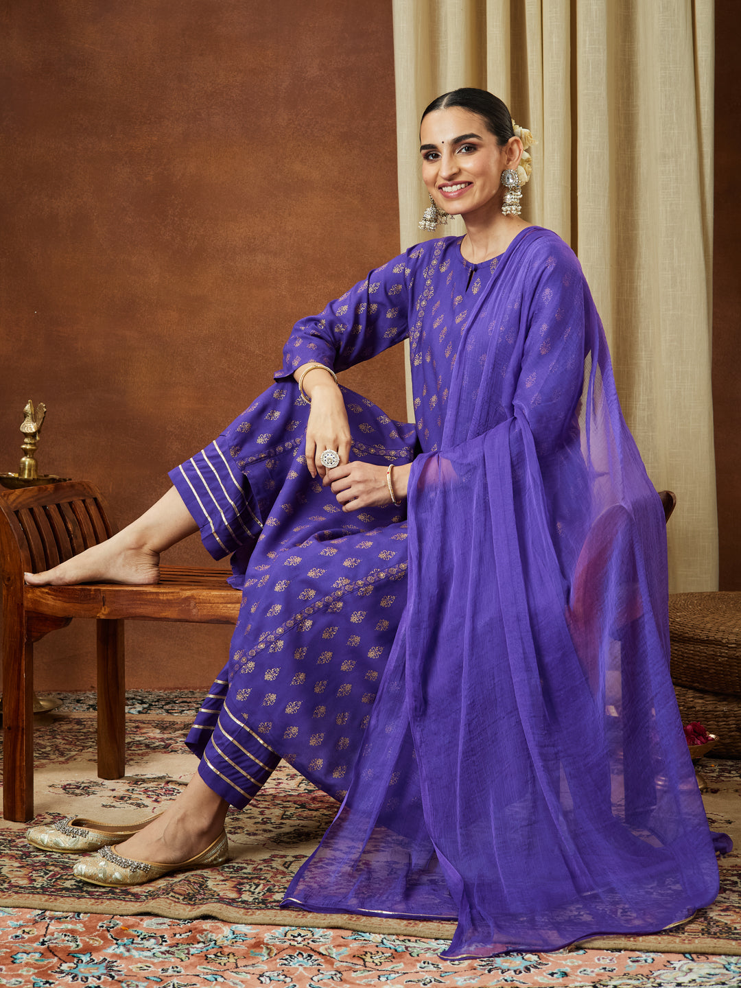 Ninnique Women's Purple Rayon Ethnic Motifs Gold Printed A-line Kurta Set