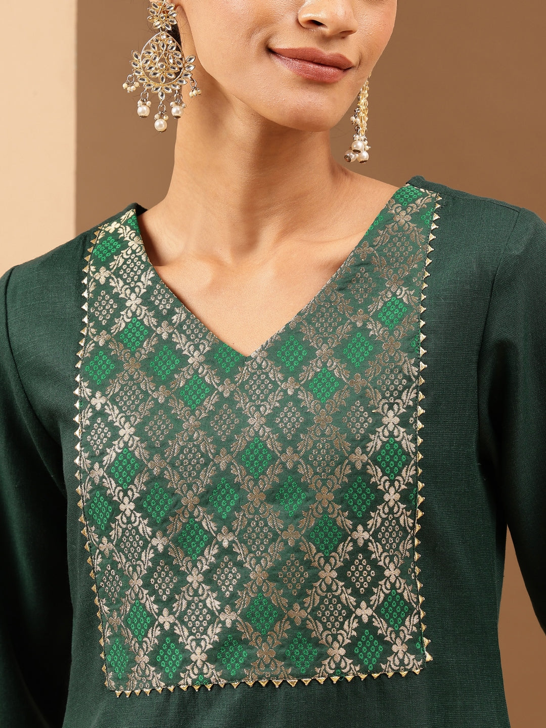 Ninnique Women's Bottle Green Cotton Blend Yoke Design Straight Kurta Set