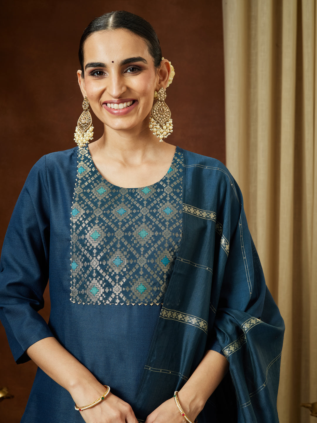 Ninnique Women's Teal Blue Cotton Blend Yoke Design Straight Kurta Set