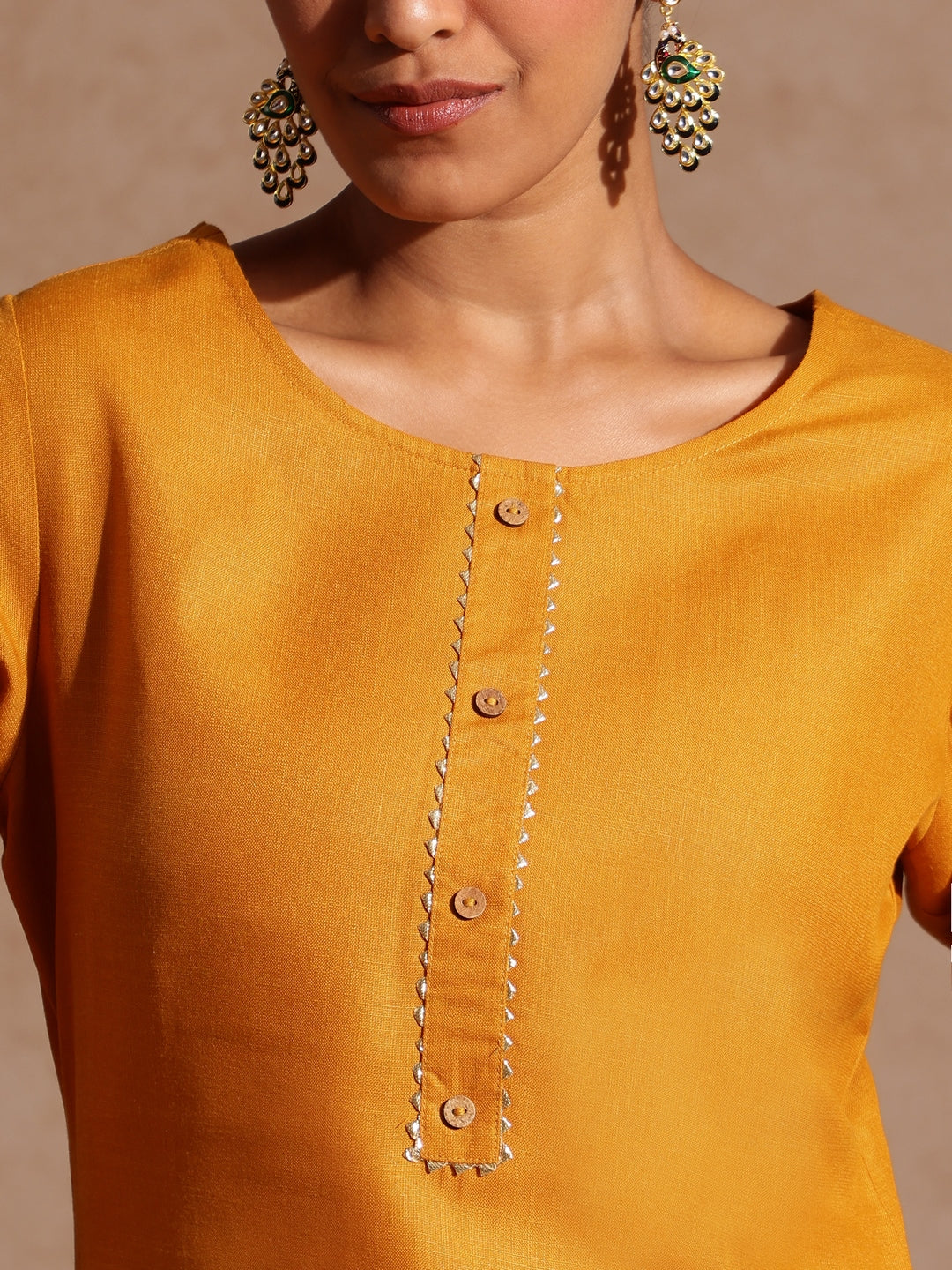 Ninnique Women's Mustard Cotton Blend Yoke Design Straight Kurta Set
