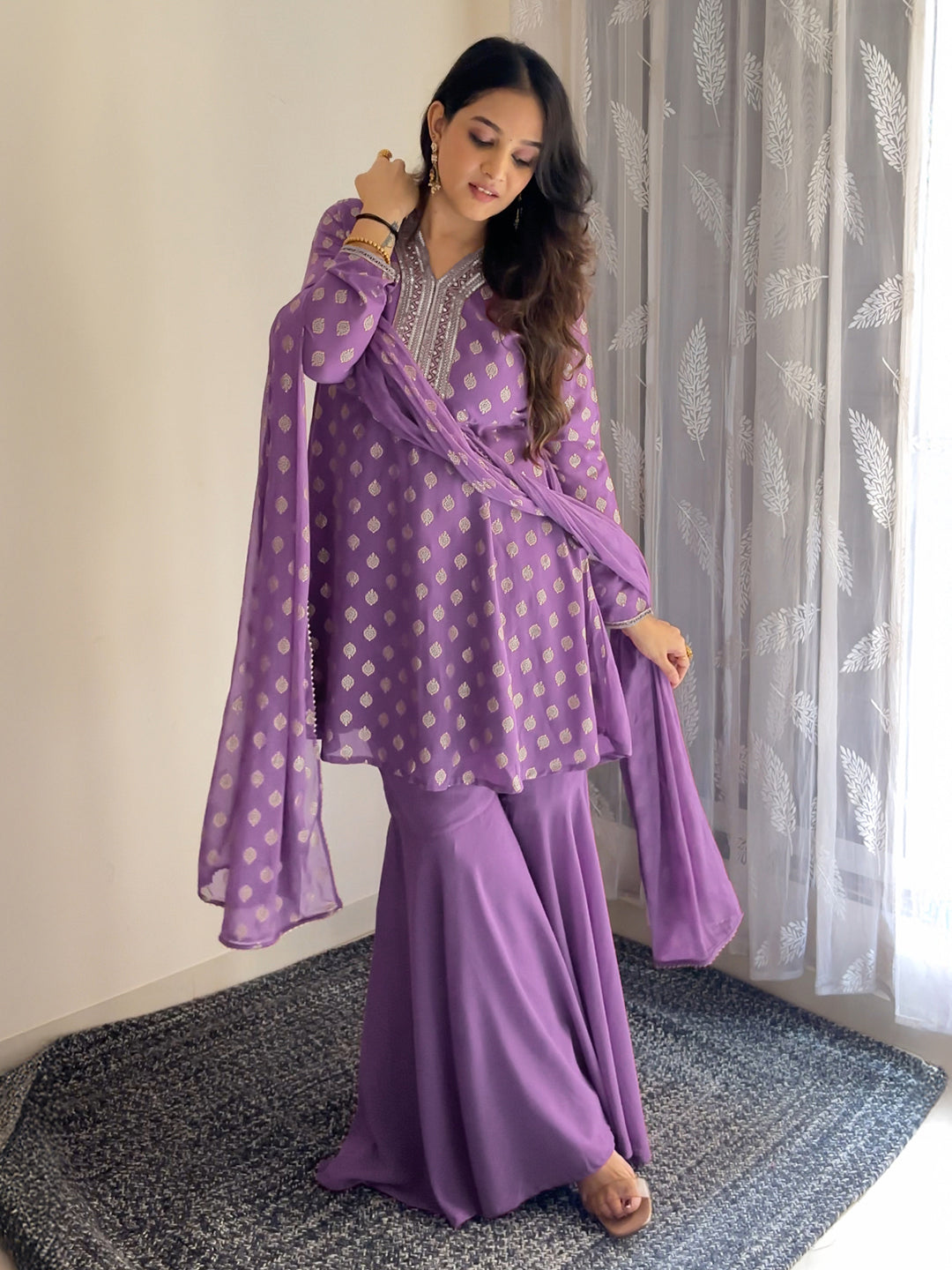 Ninnique Women's Purple Georgette Embellished Gold Printed A-line Kurta With Sharara & Dupatta Set